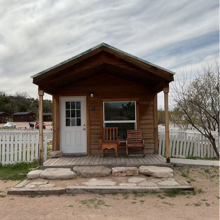 Experience the history of the wild west with an overnight stay in a large rustic Grand Canyon Western Ranch Cabin!